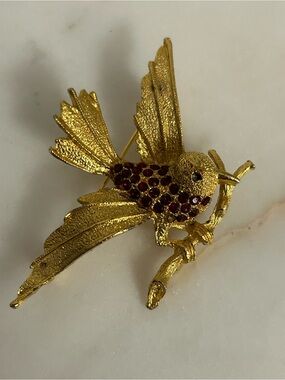 Golden Bird on a branch with Red Crystal Accents